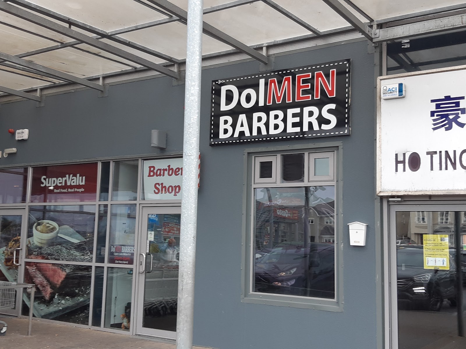 Dolmen Barbers shopfront at Sandhills Shopping Centre, Hacketstown Road, Carlow, beside SuperValu